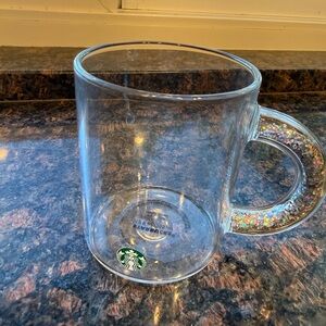 Starbucks clear holiday collection 2019 with glitter handle.